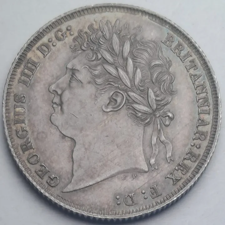 An 1824 George IV shilling that passed through our hands.